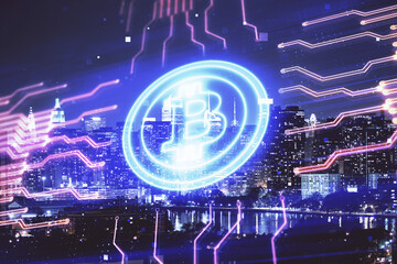 Multi exposure of cryptocurrency theme hologram drawing and city veiw background. Concept of blockchain and bitcoin.