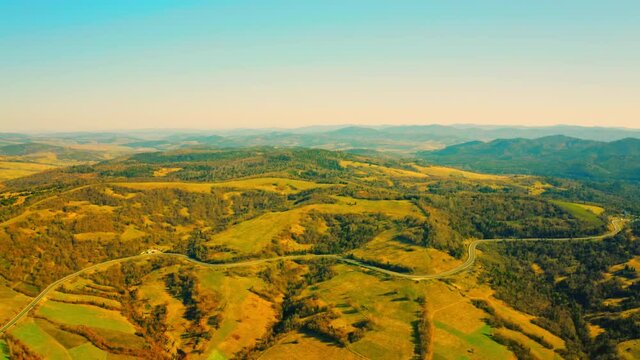 beautiful aerial view on highland in soft light morning in spring season mountains landscape road serpentine through carpathians