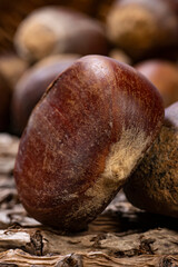 Some Chestnut On The Wood Background