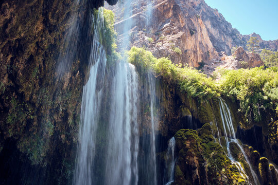 Waterfall and mossy rocks in canyon long exposure. Yerkopru waterfall, Ermenek river, Mut, Mersin province, Turkey