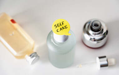 Cosmetics tubes with sticker "Self care".