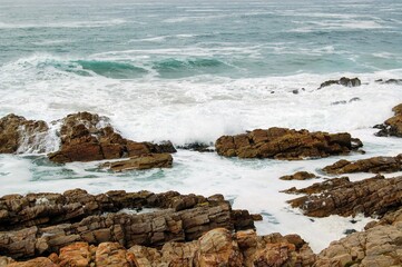 Rocky shores of the Indian ocean coastline in Mossel Bay, South Africa
