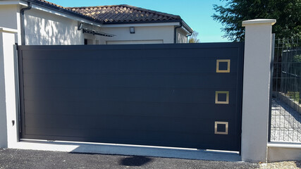 grey steel modern gate aluminum portal of home door of suburbs house in street view