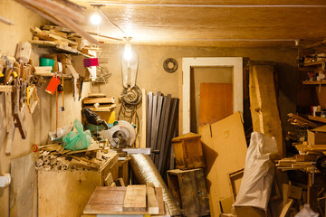 Obraz na płótnie Canvas old garage full of tools and stuff