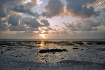 Sunrise behind the clouds in Jambiani, Zanzibar