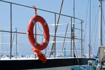 Lifebuoy on boat railings