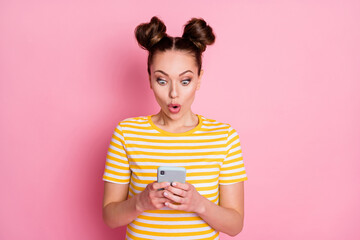 Photo of attractive lady two funny buns hold telephone blog post read news information open mouth...
