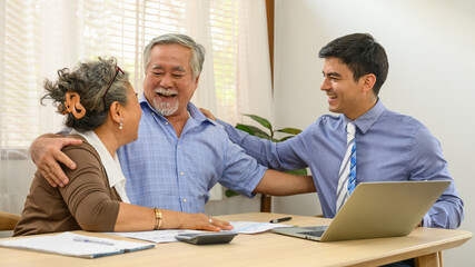 Asian senior couple feeling happy and pleasant after received advice about family financial...