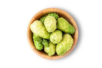 Fresh Noni fruit or Morinda citrifolia and sliced with seeds in wooden bowl  isolated on white background.Exotic bad smell fruit with best top health benefit. Clipping path,space for text and content.
