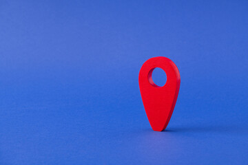 Close-up view of one red pointer GPS location find search place where to stay in vacation journey...