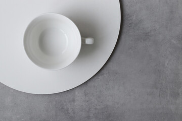 Empty cup on concrete background