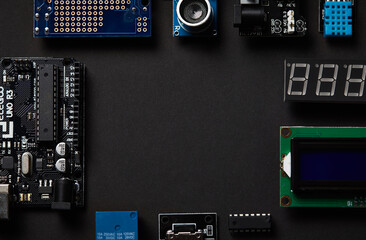 Overhead Flat Lay Shot Of Electronic Computer Components On Black Background