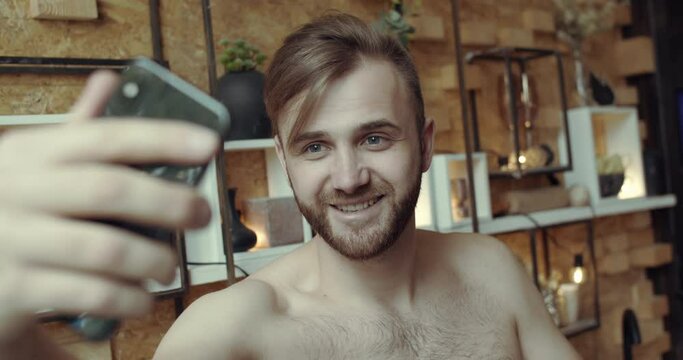 A man has a video-chat call with his girlfriend