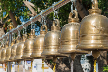 Fototapeta na wymiar Bell at Wat Phra That Si Chom Thong Worawihan in Chom Thong District, Chiang Mai, Thailand. The Monastery was originally built in 15th century.