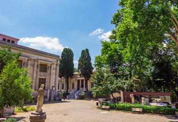 courtyard, exterior of Istanbul Archaeological Museum. Entry group. Porch. Steps. Columns of white marble. Empty museum, no visitors and tourists. Turkey, Istanbul, Sultanahmet.