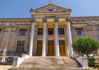 courtyard, exterior of Istanbul Archaeological Museum. Entry group. Porch. Steps. Columns of white marble. Empty museum, no visitors and tourists. Turkey, Istanbul, Sultanahmet.