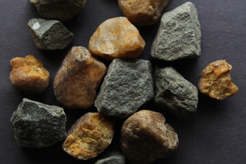 Colorful stones and pebbles display with selective focus. Beautiful stone and rock background.