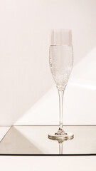 beautiful isolated wine glass on a light geometric background
