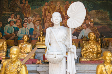 Monk Statue at Wat Phrathat Doi Suthep in Chiang Mai, Thailand. The Temple was originally built in AD 1383.