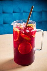 cold sangria with fresh fruits and berries
