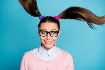 Close-up portrait of her she nice attractive lovely pretty cute funny girlish cheerful cheery college girl having fun hair flying isolated over bright vivid shine vibrant blue color background