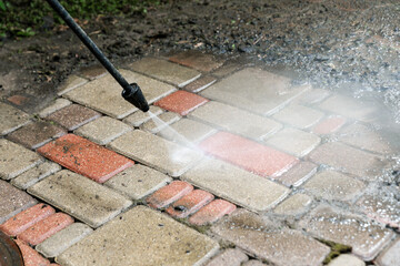 washing services - block paving cleaning with high pressure washer