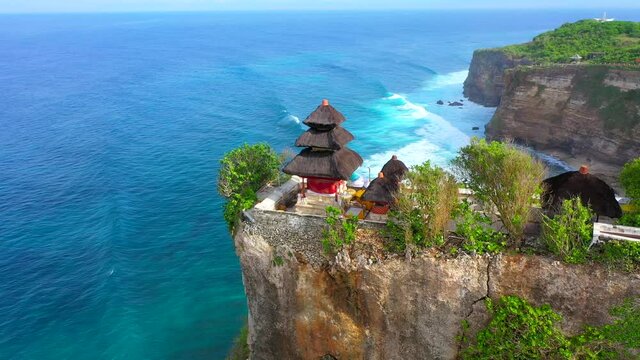 Bali - Aerial 4k footage of Pura Luhur temple in Uluwatu. Cliffs and ocean from above.	