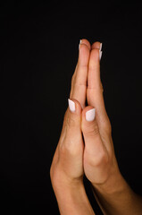 Hands in praying gesture