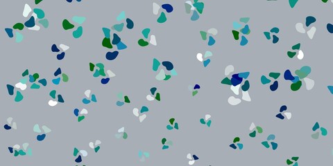 Light blue, green vector backdrop with chaotic shapes.