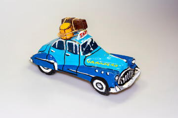 Paper car model - veteran. Souvenir from a holiday in Havna
