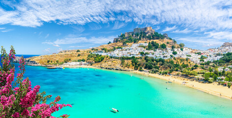 Landscape with beach and castle at Lindos village of  Rhodes, Greece - obrazy, fototapety, plakaty