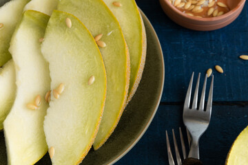 Refreshing summer food - sliced raw melon, ready to eat
