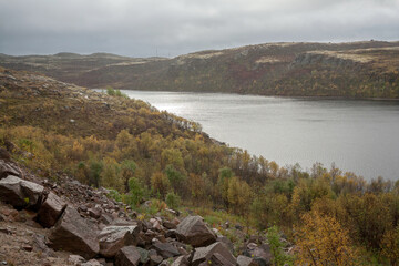 Fototapeta na wymiar Rocky Mountain in autumn season, Terabiska, Murmansk, Russia