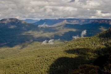The Blue Mountains view with the white clouds in Australia