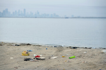 Garbage on the beach. Environmental pollution problem. Safe the planet  