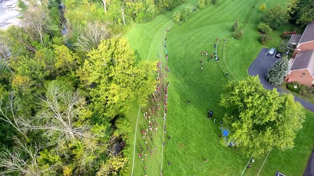 Drone Shot: Cross Country Race Group on Hills