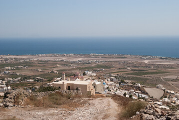 Obraz premium highlands, the city is visible in the distance, the blue sea, blue sky