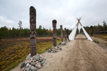 Alley of majestic idols at Sami Village, Murmansk, Russia, the four idola of elements (fire, earth,...