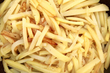 View of fried potatoes with onions