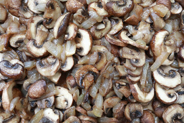 View of fried champignon with onions