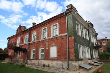 Vintage house of merchant Volkov on Saltykov-Schedrin Street, 41 in Taldom town, Russia. Building facade. Taldom landmark, architecture monument, sight, attraction © Sergey