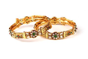 Indian golden Bangles. Bracelet with diamonds and stones on a white background, Indian Traditional Jewellery,Style, fashion and design of jewelry