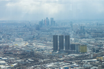 Russia, Moscow, 2019: view from the Ostankino TV tower to the city panorama, Moscow City and the Dmitrovskaya metro station