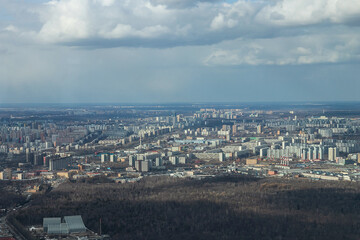 Russia, Moscow, 2019: view from the Ostankino TV tower to the panorama of the city and a large park Botanical Garden