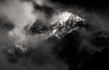 Dark stormy clouds on a mountainside in the Himalayan mountains