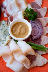 traditional Russian appetizer. bacon, onion and mustard on plate