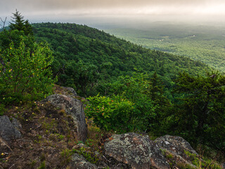 Looking back down on Crotched Mountain from the very top as a rain storm moves over in Francestown NH