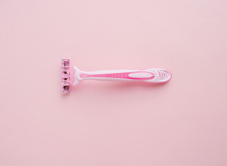 pink shaving machine on a pink background. Beauty, care, home cosmetic procedures, getting rid of unwanted hair. Place for text, inscriptions. A quick way to get rid of unwanted hair. Beautiful 