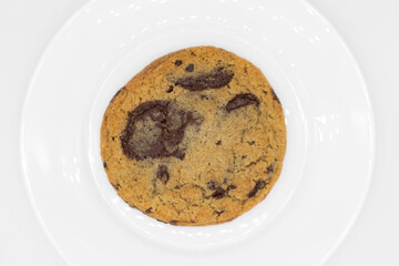 Delicious Belgian Chocolate Chip Cookie on a White Plate with a White Background