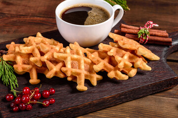 Beautiful delicious Belgian waffles on a Christmas table